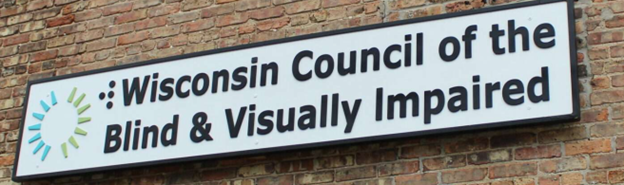 The sign showing the Council logo on the side of our building