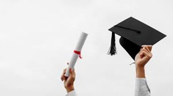 Hands holding up a diploma and a mortarboard