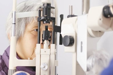 A woman having her eyes examined