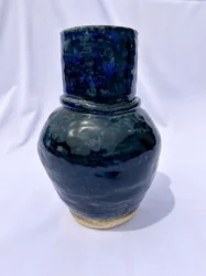 Glossy deep blue ceramic vase.