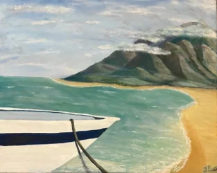 The bow of a boat rests on a beach