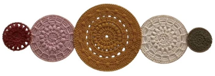 Five circular fiber art mandalas designed for yoga and meditation practice