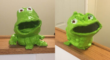 Artwork of 2 ceramic frogs